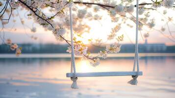 ai generato un' bianca corda swing si blocca su un' fioritura rosa sakura ramo foto