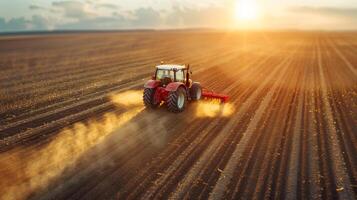 ai generato trattore fertilizza un' coltivato agricolo campo a partire dal il aria. foto