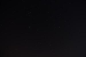 stella polvere nel il buio notte. foto