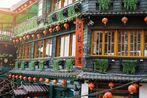 jiufen vecchio strada villaggio con tè Casa. punto di riferimento e popolare per turisti attrazioni vicino taipei città. Taiwan viaggio e vacanza concetto. lettere con si intende tè negozio foto