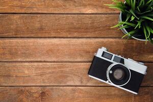 di legno sfondo con un' telecamera, design modello per aggiungendo testo foto