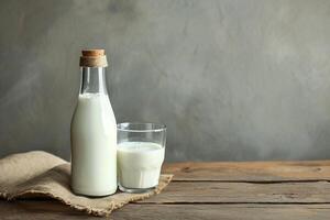 ai generato bottiglia di latte e bicchiere con avena fiocchi su di legno tavolo. foto