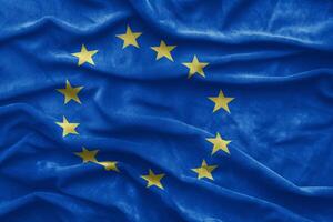 ai generato agitando europeo unione bandiera, vicino su di europeo bandiera foto