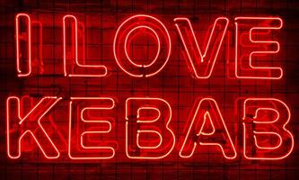 neon splendente cartello nel rosso colore su un' mattone parete nel il buio con il iscrizione o slogan io amore kebab. mattone parete, sfondo. luminosa elettrico neon luce. bar-ristorante doner kebab. foto