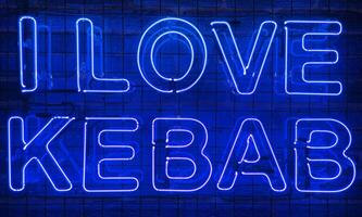 neon splendente cartello nel blu colore su un' mattone parete con il iscrizione o slogan io amore kebab. mattone parete, sfondo. luminosa elettrico neon luce. bar-ristorante doner kebab. foto