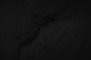 pietra nero struttura sfondo. buio cemento, calcestruzzo grunge. piastrella grigio, marmo modello, parete nero sfondo vuoto per design foto