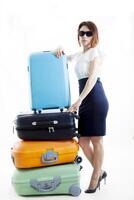 attività commerciale donna con sua valigie pronto per partire foto