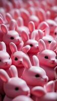 ai generato foto di il mare un' folla di rosa plastica latice carino conigli coniglietti. ai generato