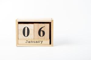 di legno calendario gennaio 06 su un' bianca sfondo foto