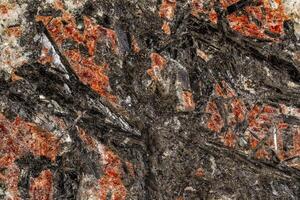 macro di un' pietra stibnite minerale su un' bianca sfondo foto