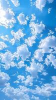 ai generato bellissimo naturale sfondo con vasto blu cielo e soffice nuvole verticale mobile sfondo foto