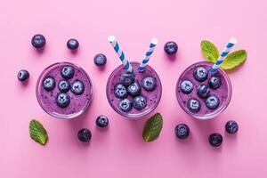 ai generato bicchieri di mirtilli frullato o shake con fresco mirtilli e menta foto