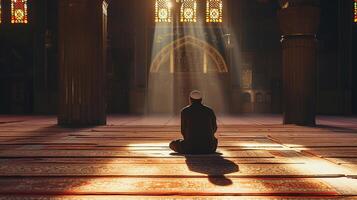 ai generato indietro Visualizza di un' musulmano uomo preghiere nel moschea, Ramadan mubarak, islamico concetto foto