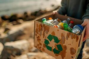 ai generato mani Tenere un' raccolta differenziata scatola pieno con vario riciclabile elementi su spiaggia ..ambiente giorno concetto. generativo ai foto