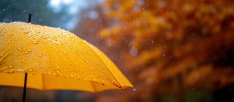 ai generato vicino su, giallo ombrello sotto pioggia contro un' sfondo di autunno le foglie. concetto di piovoso tempo atmosferico. foto