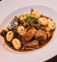 buongustaio Gnocchi piatto con Manzo ragù foto