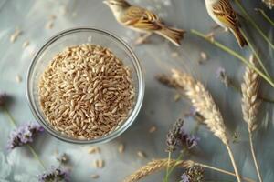 ai generato un' bicchiere ciotola con grano e uccelli su esso foto