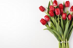 ai generato mazzo di bellissimo rosso tulipani su un' bianca sfondo con spazio per testo. La madre di giorno, marzo 8, compleanno. generato di artificiale intelligenza foto