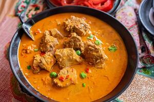 assaporare il squisito agnello o Manzo curry rendang, pronto per essere apprezzato su eid al-adha, cattura il essenza di celebrazione nel un' Perfetto foto, in mostra culinario padronanza e festivo indulgenza foto