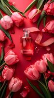 ai generato bottiglia di profumo e tulipani su rosa sfondo, primavera piatto posare foto