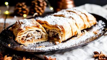 ai generato un' delizioso Mela strudel spolverato con in polvere zucchero, servito su un' piatto con festivo illuminazione nel il sfondo. copia spazio. foto