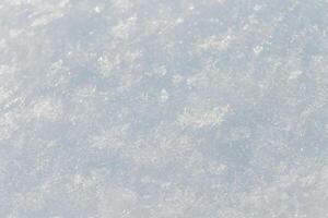 bianca neve struttura con fiocchi di neve, avvicinamento foto