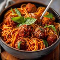 italiano spaghetti e Polpette nel un' ciotola foto