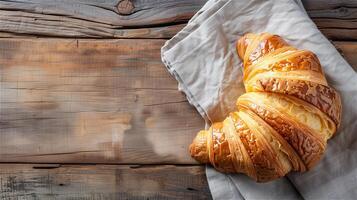 ai generato francese brioche su di legno tavolo foto