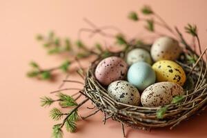 ai generato nido con colorato Pasqua uova e primavera fiori su un' pesca colorato sfondo foto