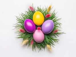 ai generato Pasqua uova rosa, giallo, viola menzogna nel un' nido di verde erba su un' bianca sfondo. superiore Visualizza foto