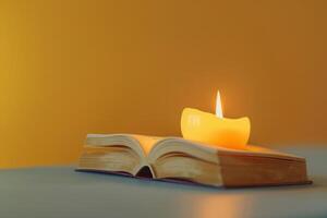 ai generato candela e libro nel il concetto di lettura e rilassamento foto