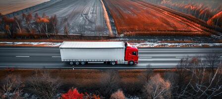 ai generato aereo fuco Visualizza di auto e camion guida su autostrada strada a partire dal sopra, mezzi di trasporto concetto foto