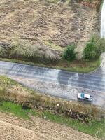 aereo Visualizza di Britannico campagna e agricolo azienda agricola terra a villaggio di Inghilterra UK. marzo 1°, 2024 foto