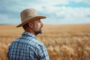 ai generato contadino è in piedi indietro su il suo azienda agricola foto