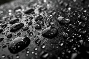 ai generato avvicinamento di acqua gocce su un' nero superficie con sfocatura. orizzontale astratto sfondo. generato di artificiale intelligenza foto