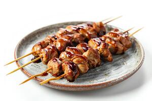 ai generato yakitori servito su un' piatto isolato su un' bianca sfondo foto