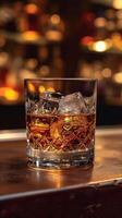 ai generato bicchiere di whisky con ghiaccio cubi su il di legno tavolo foto