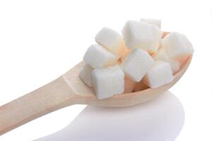 zucchero cubi su bianca foto
