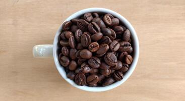 caffè fagioli sfondo. vicino su di arrostito caffè fagioli. foto