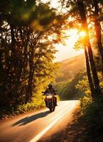 ai generato motociclista equitazione un' motociclo su un' nazione strada a tramonto. ai generativo foto