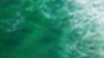 sfocato mare verde sfondo, astratto sfocatura sfocato sfondo foto