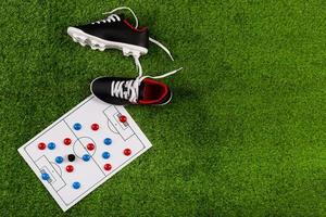 composizione calcio con scarpe da tavola foto