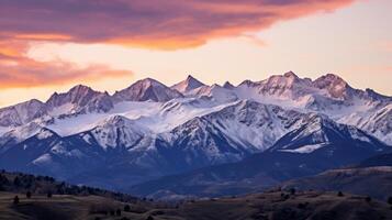 ai generato tramonto al di sopra di neve coperto picchi foto