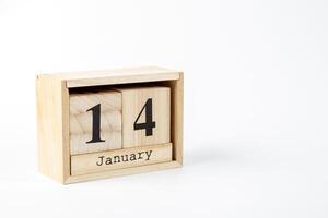 di legno calendario gennaio 14 su un' bianca sfondo foto