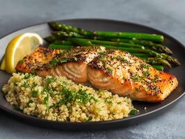 ai generato grigliato salmone quinoa e al vapore asparago omega 3 ricco pasto foto