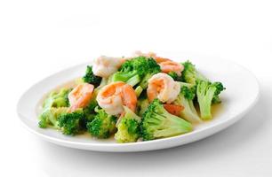 cibo sano tailandese broccoli saltati in padella con gamberi foto