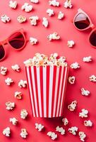 ai generato Popcorn secchio con occhiali da sole su un' luminosa rosso sfondo suggerendo un' film tema foto