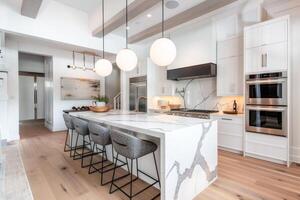ai generato moderno cucina interno con marmo isola, pendente illuminazione, e inossidabile acciaio elettrodomestici foto