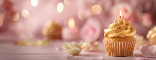 ai generato un' superiore oro candela su un' Cupcake impostato contro un' morbido pastello rosa fondale foto