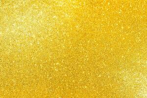 radiante d'oro luccichio struttura sfondo scintillante con eleganza. foto